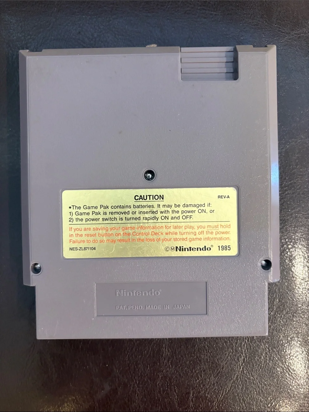 Nintendo NES Game Cartridge with Yellow Caution Label
